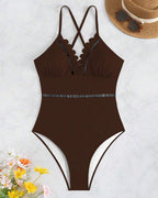 Solid-color one-piece swimsuit with cutouts