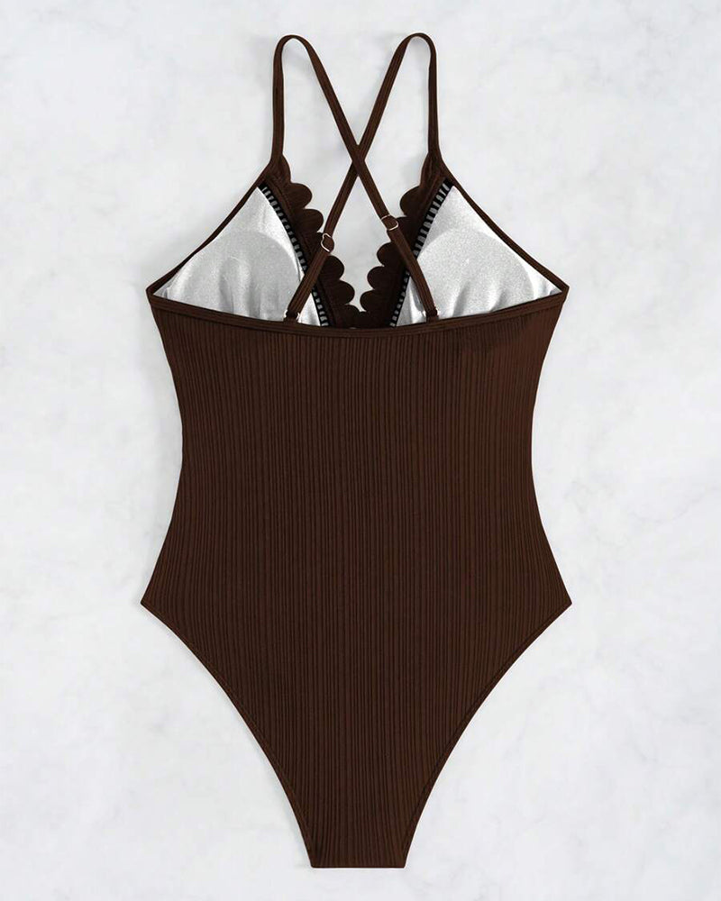 Solid-color one-piece swimsuit with cutouts