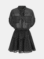 Conjunto de camisa transparente y minifalda de lunares