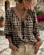 Blusa de lunares con encaje