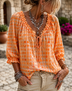 Blusa de lunares con encaje