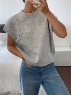 Camiseta de manga corta con diseño floral y silueta fluida